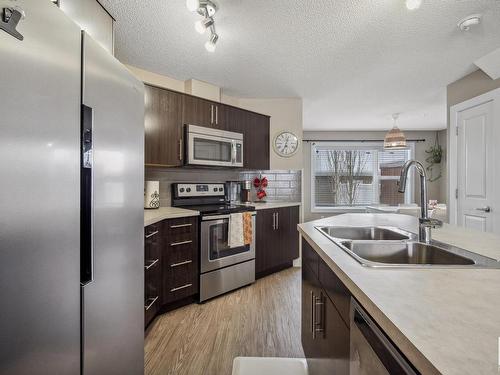 184 Southfork Drive, Leduc, AB - Indoor Photo Showing Kitchen With Double Sink