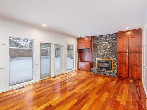 579 Wahstao Road, Edmonton, AB - Indoor Photo Showing Living Room With Fireplace