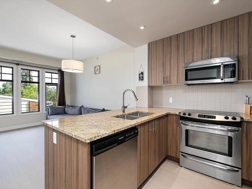 302 10140 150 Street, Edmonton, AB - Indoor Photo Showing Kitchen With Stainless Steel Kitchen With Double Sink