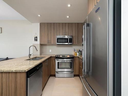 302 10140 150 Street, Edmonton, AB - Indoor Photo Showing Kitchen With Stainless Steel Kitchen With Double Sink With Upgraded Kitchen