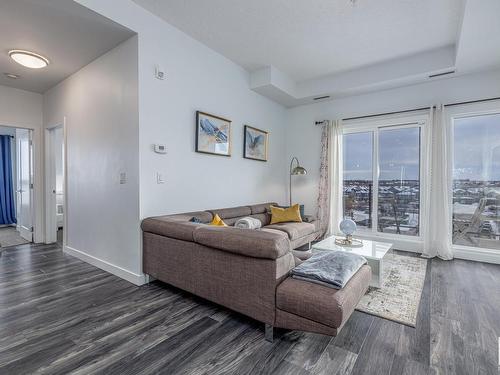 512 1316 Windermere Way, Edmonton, AB - Indoor Photo Showing Living Room