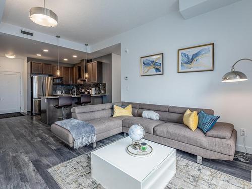 512 1316 Windermere Way, Edmonton, AB - Indoor Photo Showing Living Room