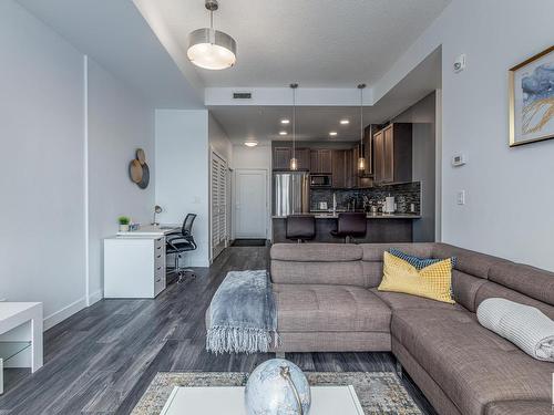 512 1316 Windermere Way, Edmonton, AB - Indoor Photo Showing Living Room