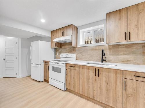 6515 98A Street, Edmonton, AB - Indoor Photo Showing Kitchen With Double Sink