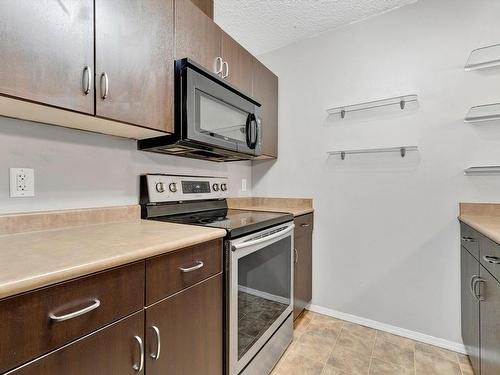 134 1180 Hyndman Road, Edmonton, AB - Indoor Photo Showing Kitchen