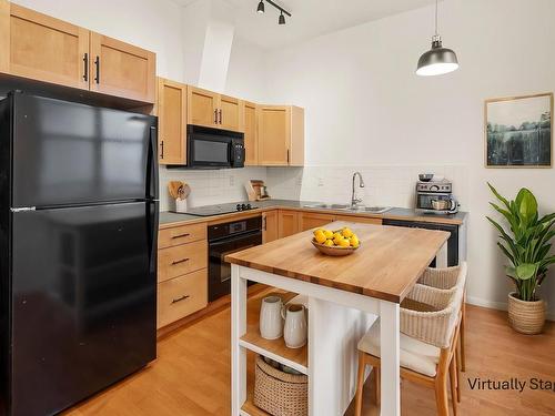 422 10407 122 Street, Edmonton, AB - Indoor Photo Showing Kitchen With Double Sink