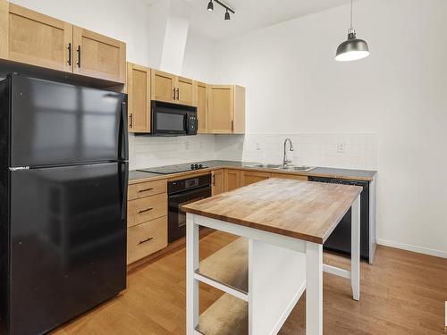 422 10407 122 Street, Edmonton, AB - Indoor Photo Showing Kitchen With Double Sink