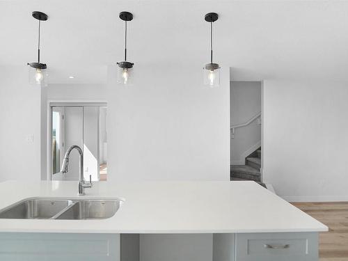 17318 6A Street, Edmonton, AB - Indoor Photo Showing Kitchen With Double Sink