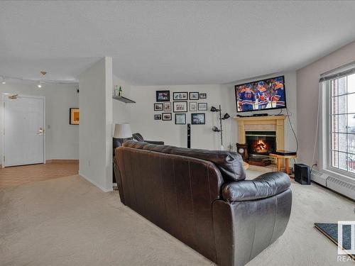 612 3 Perron Street, St. Albert, AB - Indoor Photo Showing Living Room With Fireplace