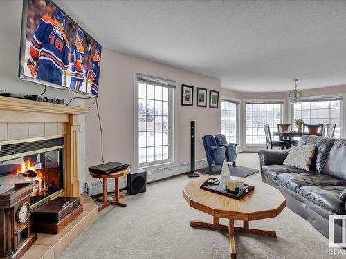 612 3 Perron Street, St. Albert, AB - Indoor Photo Showing Living Room With Fireplace