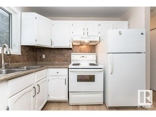 8516 33 Avenue, Edmonton, AB - Indoor Photo Showing Kitchen With Double Sink