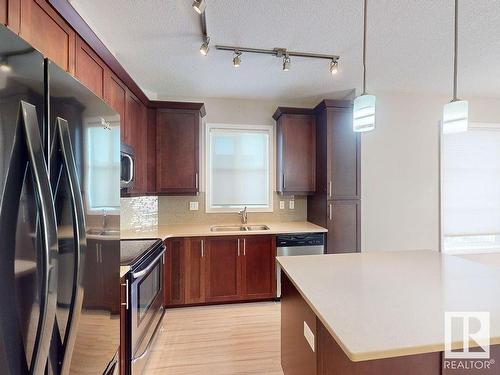 413 2590 Anderson Way, Edmonton, AB - Indoor Photo Showing Kitchen With Double Sink