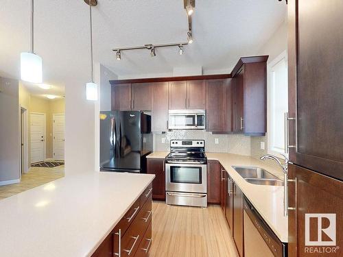 413 2590 Anderson Way, Edmonton, AB - Indoor Photo Showing Kitchen With Double Sink