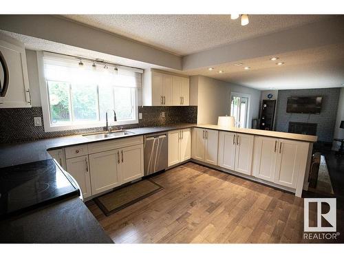 615 Wahstao Road, Edmonton, AB - Indoor Photo Showing Kitchen With Double Sink