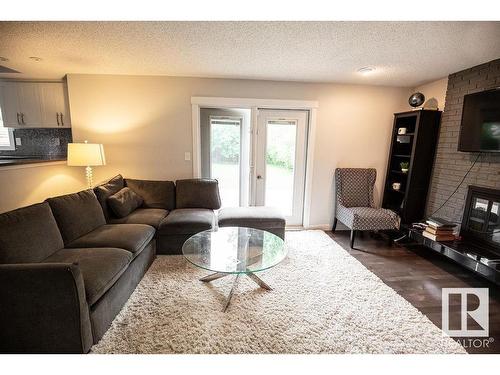 615 Wahstao Road, Edmonton, AB - Indoor Photo Showing Living Room With Fireplace