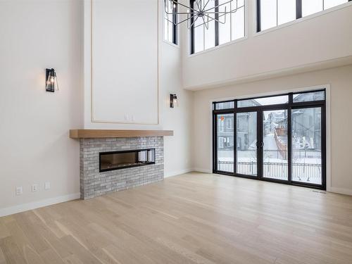 6888 Knox Loop Sw, Edmonton, AB - Indoor Photo Showing Living Room With Fireplace