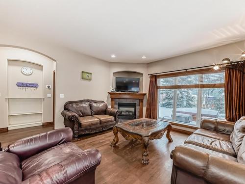 19 Deer Park Point(E), Spruce Grove, AB - Indoor Photo Showing Living Room With Fireplace