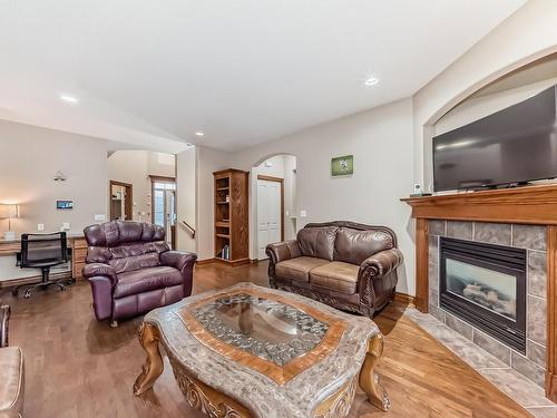 19 Deer Park Point(E), Spruce Grove, AB - Indoor Photo Showing Living Room With Fireplace