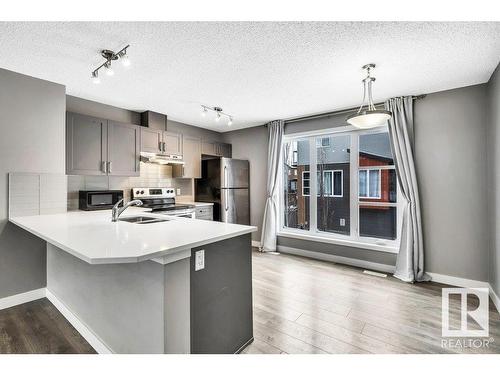 35 4470 Prowse Road, Edmonton, AB - Indoor Photo Showing Kitchen With Double Sink