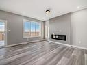 3724 67 Street, Beaumont, AB  - Indoor Photo Showing Living Room With Fireplace 