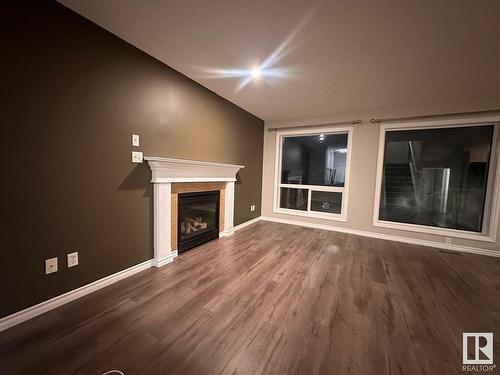 417 86 Street, Edmonton, AB - Indoor Photo Showing Other Room With Fireplace