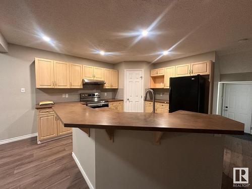 417 86 Street, Edmonton, AB - Indoor Photo Showing Kitchen With Double Sink