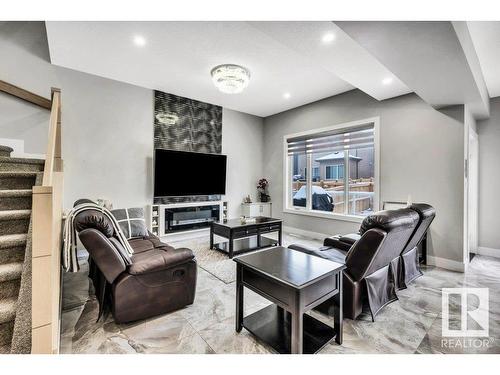 363 Glenridding Ravine Road, Edmonton, AB - Indoor Photo Showing Living Room With Fireplace