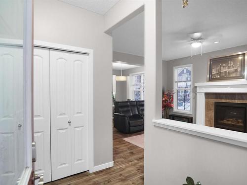 8404 24 Avenue Sw, Edmonton, AB - Indoor Photo Showing Other Room With Fireplace