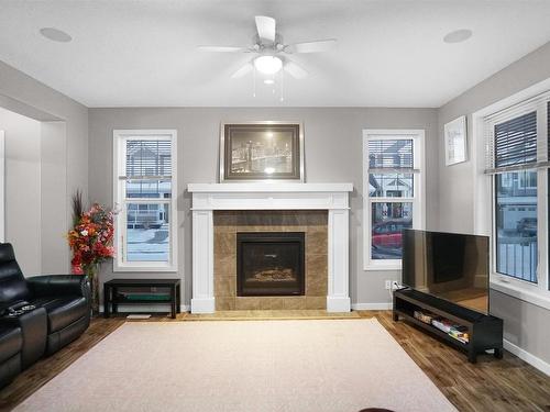 8404 24 Avenue Sw, Edmonton, AB - Indoor Photo Showing Living Room With Fireplace