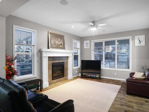 8404 24 Avenue Sw, Edmonton, AB - Indoor Photo Showing Living Room With Fireplace