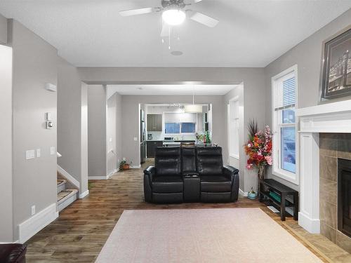 8404 24 Avenue Sw, Edmonton, AB - Indoor Photo Showing Living Room With Fireplace