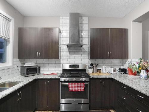 8404 24 Avenue Sw, Edmonton, AB - Indoor Photo Showing Kitchen With Upgraded Kitchen