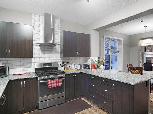 8404 24 Avenue Sw, Edmonton, AB - Indoor Photo Showing Kitchen With Upgraded Kitchen