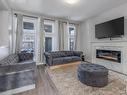 22353 93A Avenue, Edmonton, AB  - Indoor Photo Showing Living Room With Fireplace 