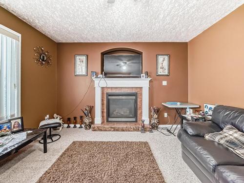 6344 166 Avenue, Edmonton, AB - Indoor Photo Showing Living Room With Fireplace