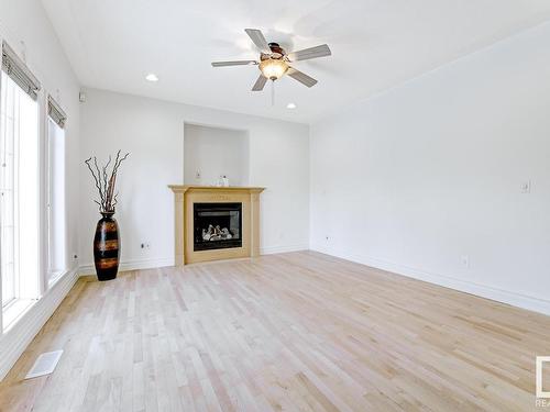 3020 Macneil Way, Edmonton, AB - Indoor Photo Showing Living Room With Fireplace