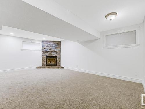 3020 Macneil Way, Edmonton, AB - Indoor Photo Showing Other Room With Fireplace