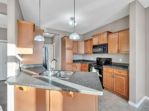 104 Westerra Boulevard, Stony Plain, AB - Indoor Photo Showing Kitchen With Double Sink