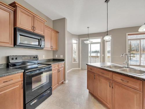 104 Westerra Boulevard, Stony Plain, AB - Indoor Photo Showing Kitchen With Double Sink