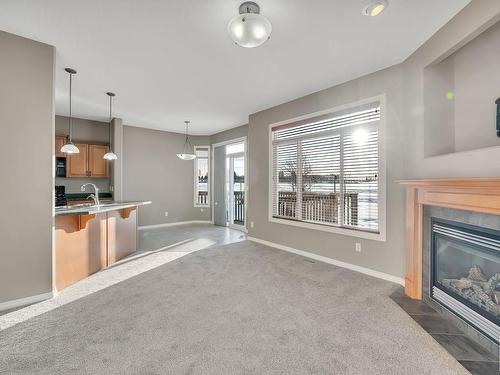 104 Westerra Boulevard, Stony Plain, AB - Indoor Photo Showing Living Room With Fireplace