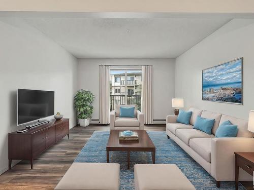 306 1188 Hyndman Road, Edmonton, AB - Indoor Photo Showing Living Room