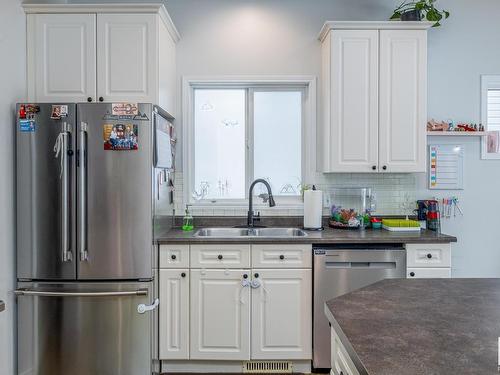 37 Birchmont Crescent, Leduc, AB - Indoor Photo Showing Kitchen With Double Sink