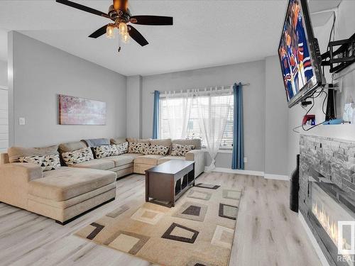 285 Ameena Drive, Leduc, AB - Indoor Photo Showing Living Room With Fireplace