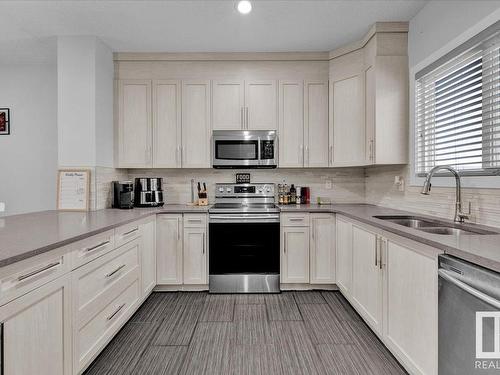 285 Ameena Drive, Leduc, AB - Indoor Photo Showing Kitchen With Double Sink