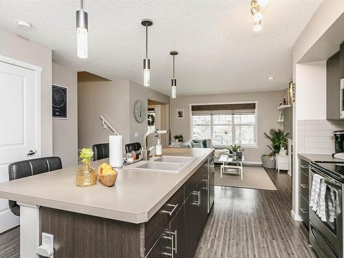 16023 10 Avenue, Edmonton, AB - Indoor Photo Showing Kitchen With Double Sink With Upgraded Kitchen