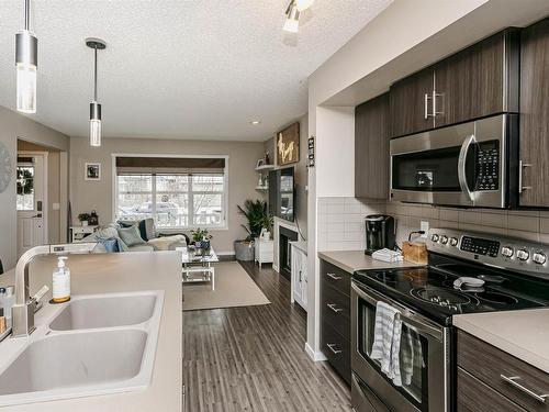 16023 10 Avenue, Edmonton, AB - Indoor Photo Showing Kitchen With Double Sink