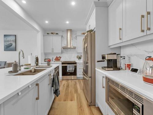 2214 Donaghey Way, Edmonton, AB - Indoor Photo Showing Kitchen With Double Sink