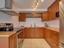 5612 93A Avenue, Edmonton, AB  - Indoor Photo Showing Kitchen With Double Sink 