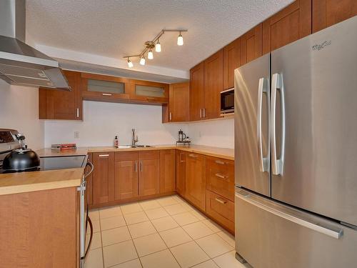 5612 93A Avenue, Edmonton, AB - Indoor Photo Showing Kitchen With Double Sink