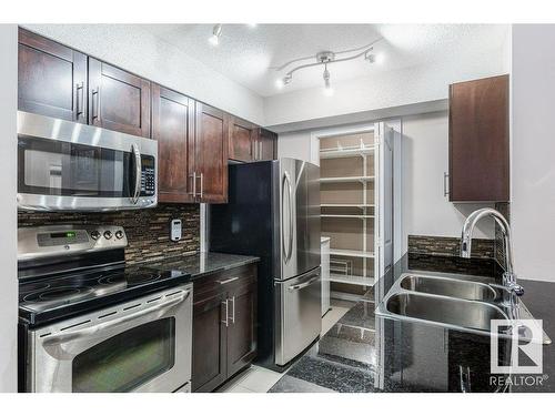 213 530 Watt Boulevard Sw, Edmonton, AB - Indoor Photo Showing Kitchen With Double Sink